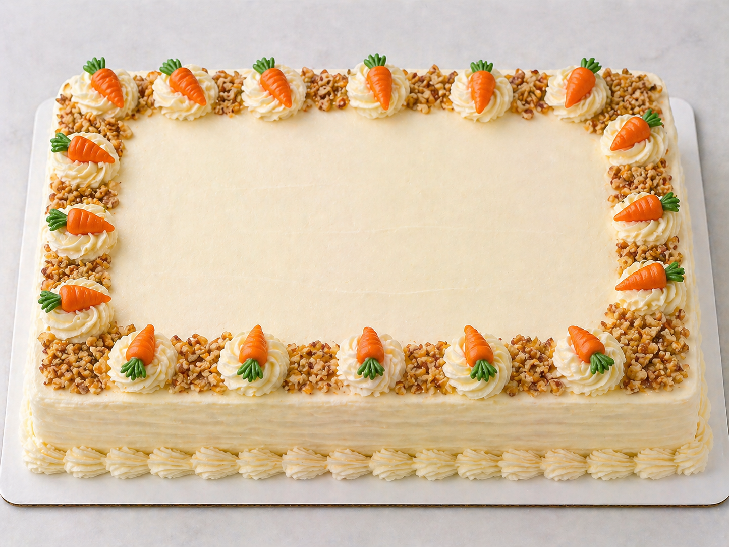 Rectangular cake decorated with carrot decorations on a white background